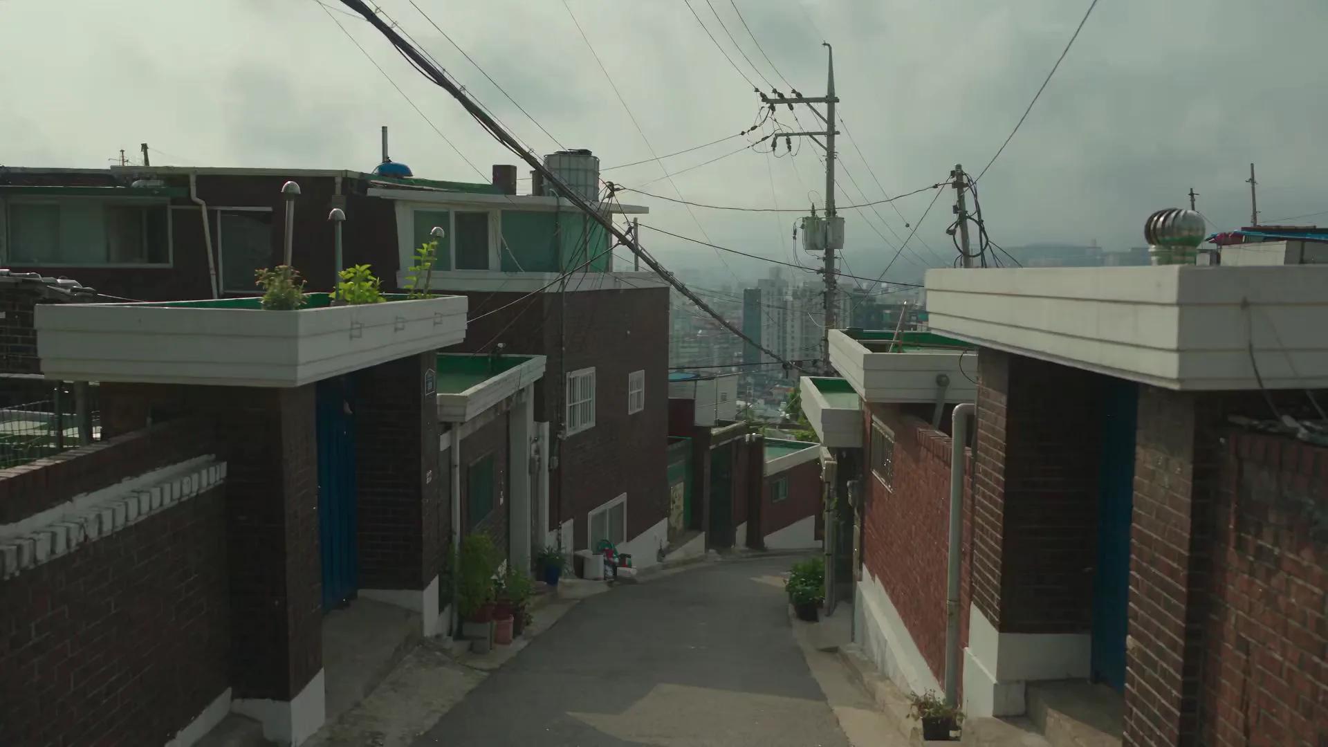 Cinematic Slice-of-Life Walk Through Old Seoul Hillside - Video prompt preview