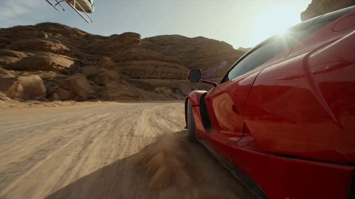 A hyper-realistic, high-octane cinematic video captures a red supercar dr...