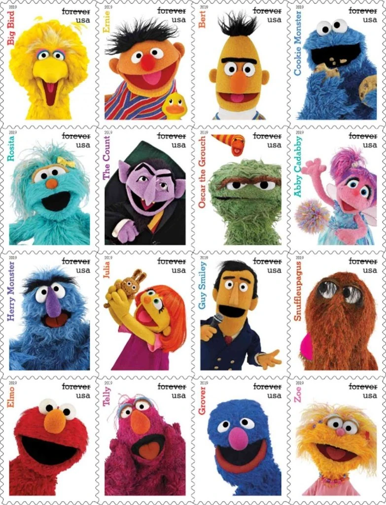 Group portrait featuring Sesame Street characters